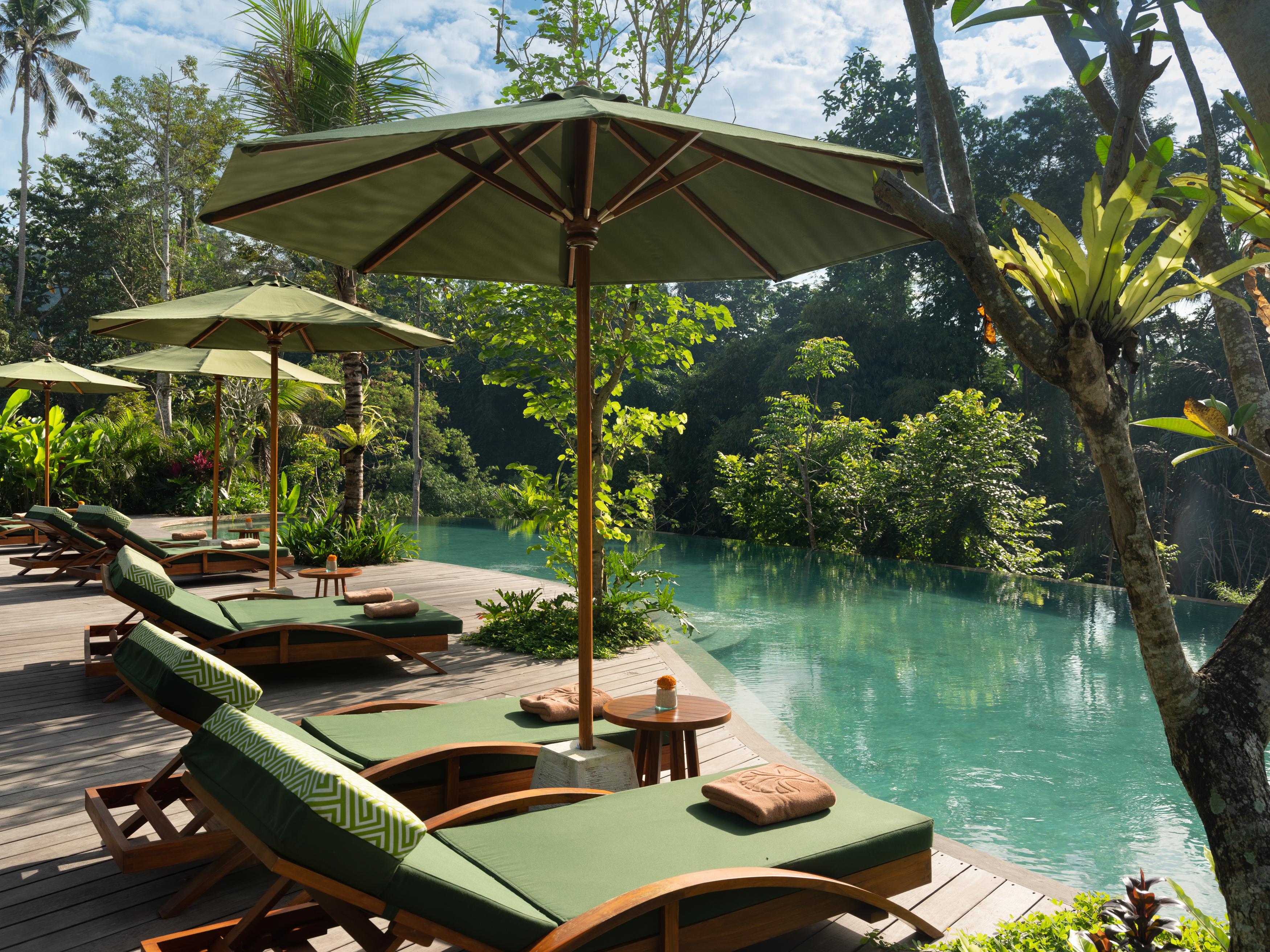 Отель Adiwana Suweta Убуд Экстерьер фото The resort's swimming pool